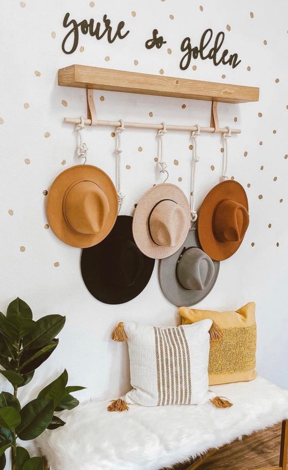 hats hanging from the hooks