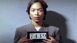 Rosa Parks (Angela Bassett)  is arrested while fighting for Civil Rights