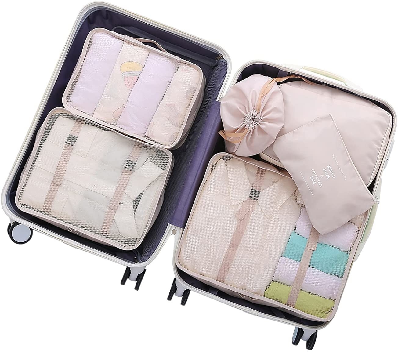 the beige packing cubes filled and inside a suitcase