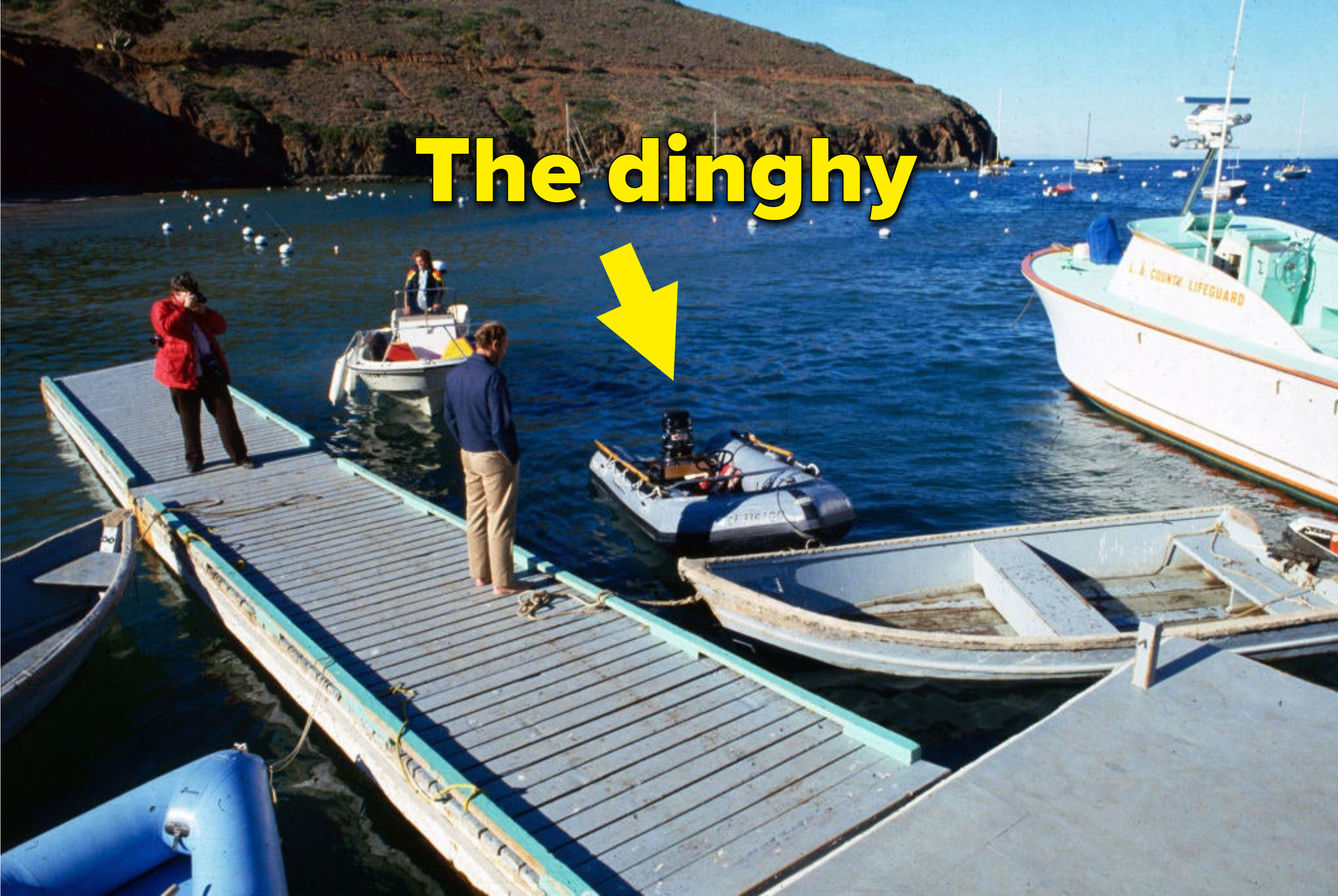 Thee dinghy in question in the water near catalina