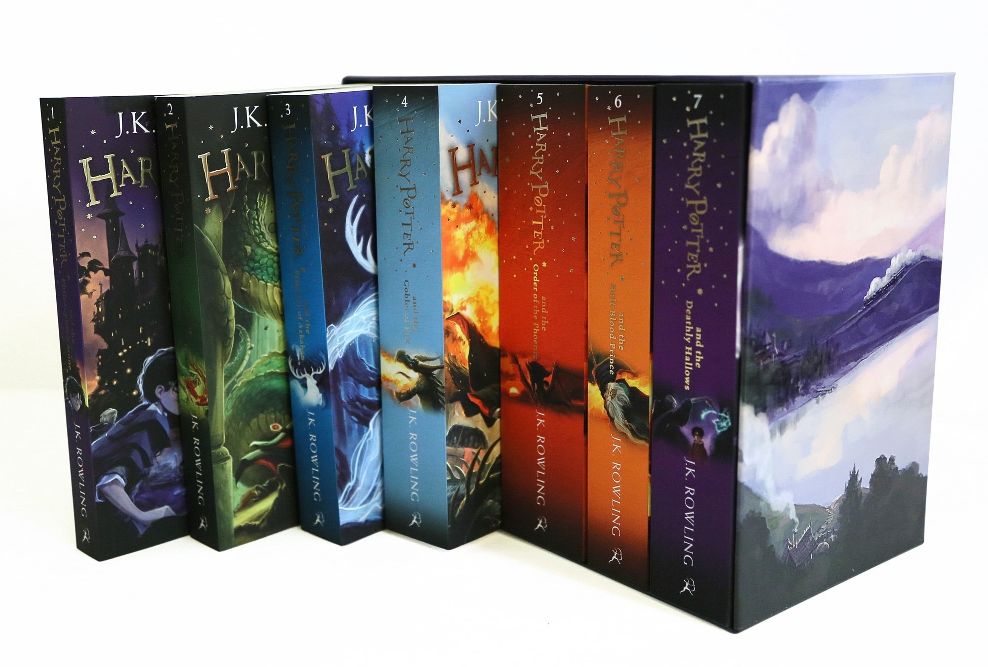 The box set of Harry Potter books, the first four taken out slightly to see the illustrated covers.