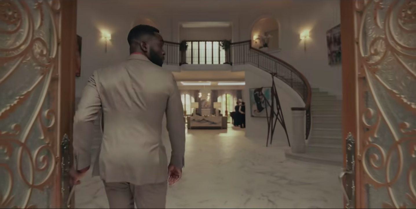 xx as Jeffery opening the doors to the enormous hallway of the Bel-Air mansion