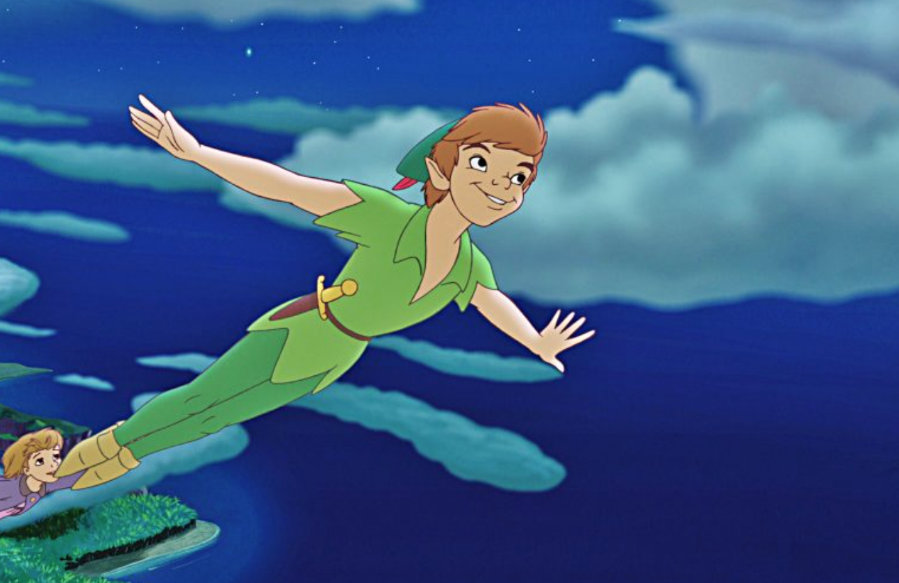 Peter Pan flies through the air with his arms outstretched