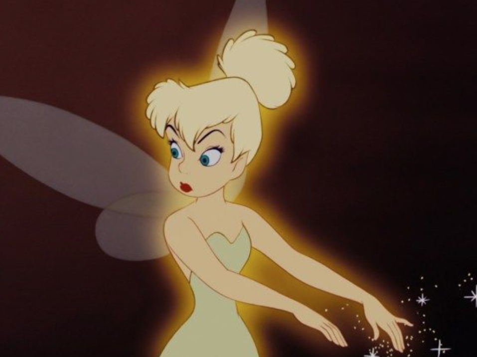 A close up of Tinkerbell the fairy as she has her head turned to the side