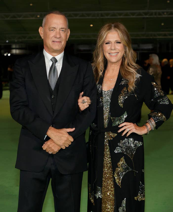 Tom and Rita arm-in-arm at an event