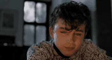 Timothée Chalamet as Emilio cries by the fire in &quot;Call Me by Your Name&quot;