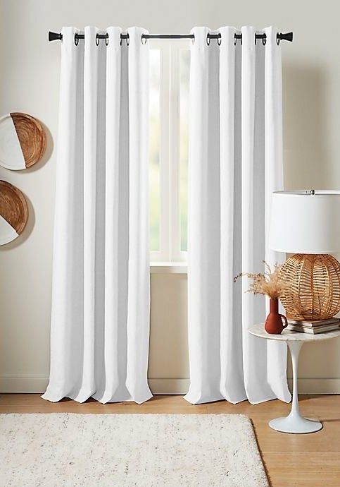 the curtains in white in a room