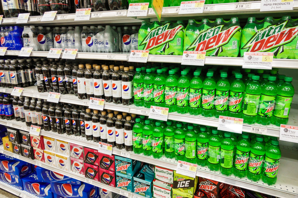 The soda aisle in a grocery store.
