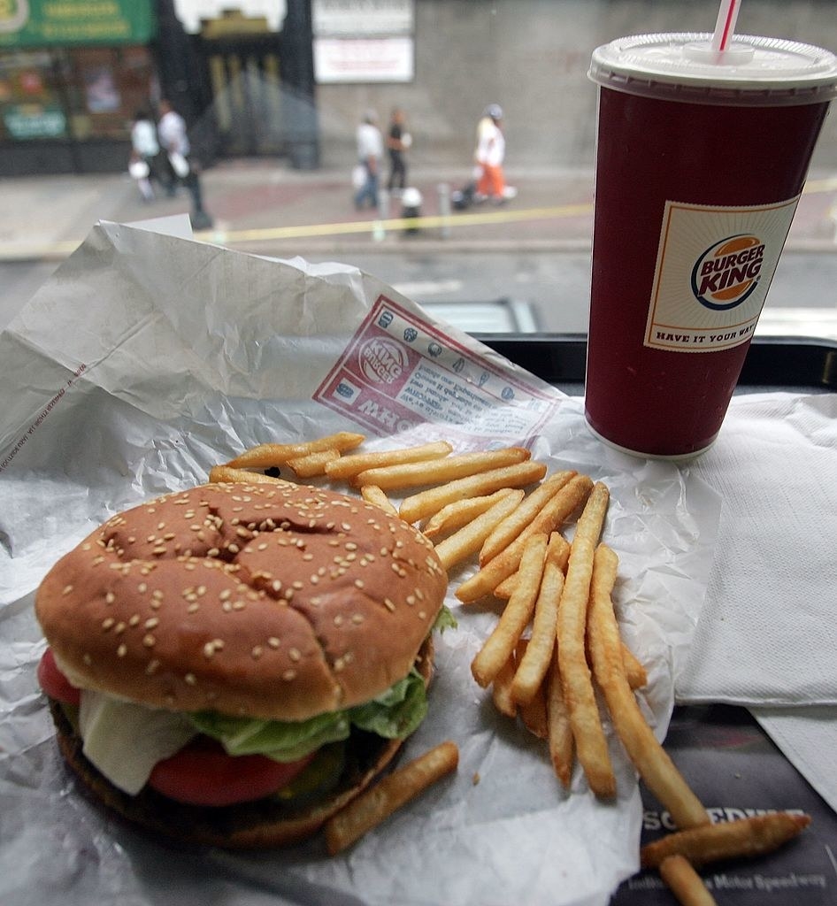 A burger, fries, and a soda from Burger King.