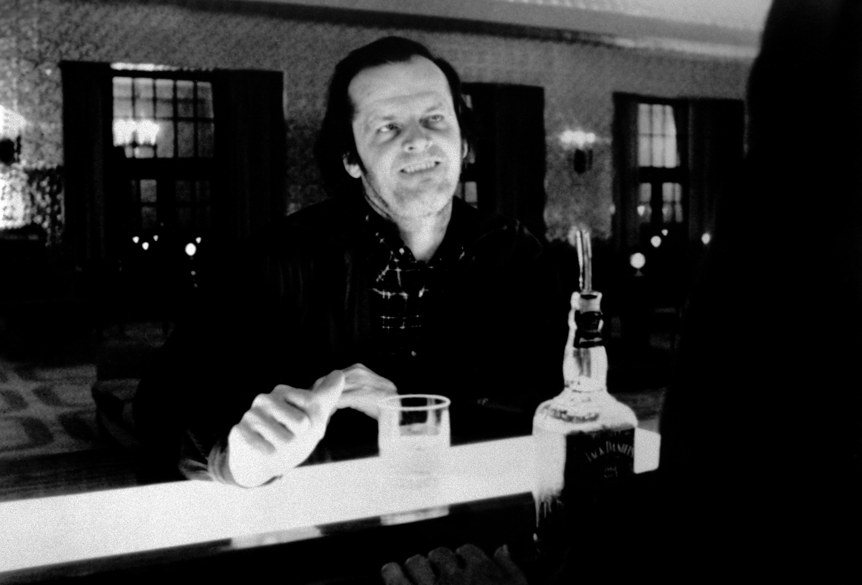 Jack Nicholson sitting at a bar