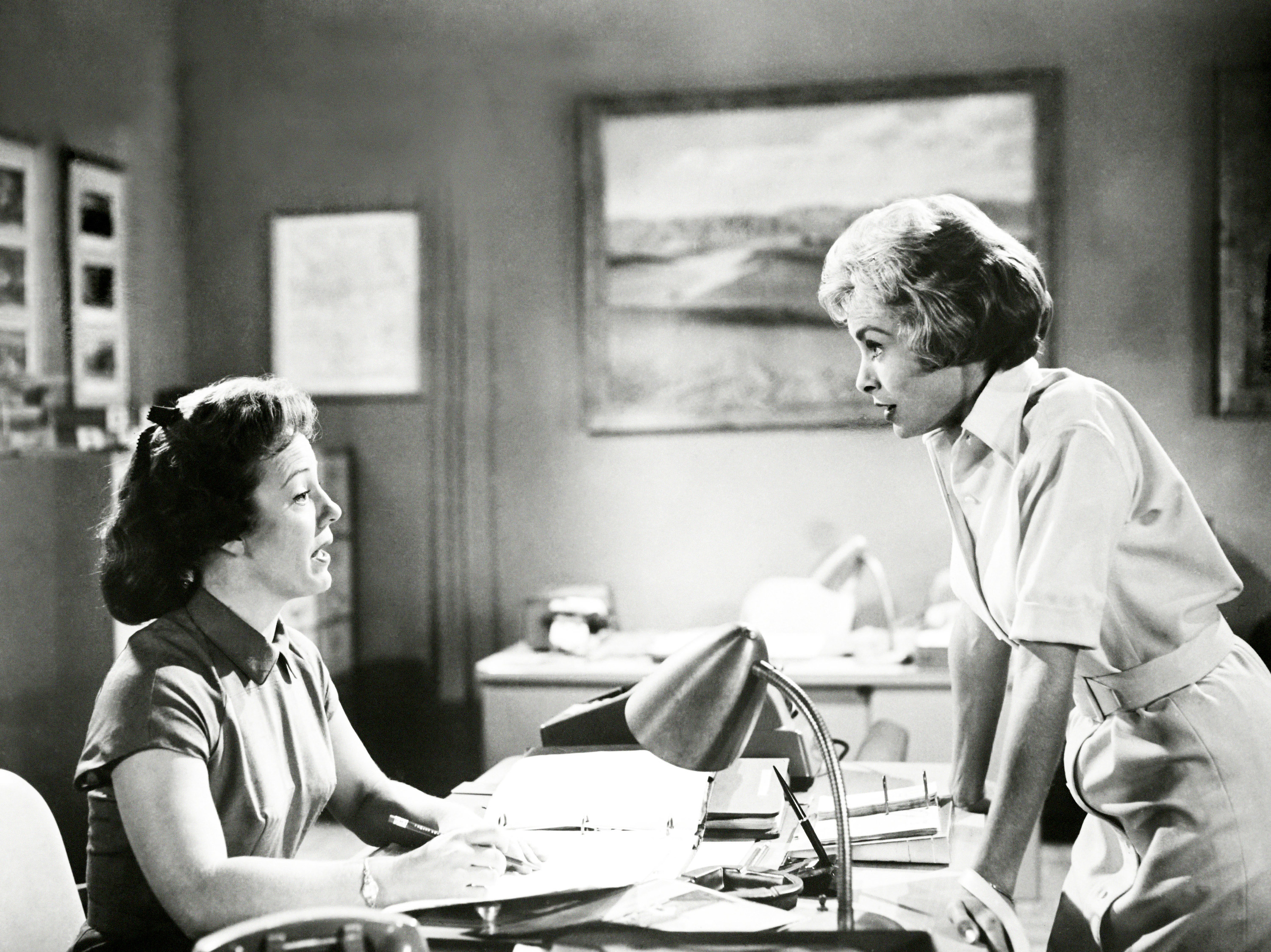 black and white shot of women in an office