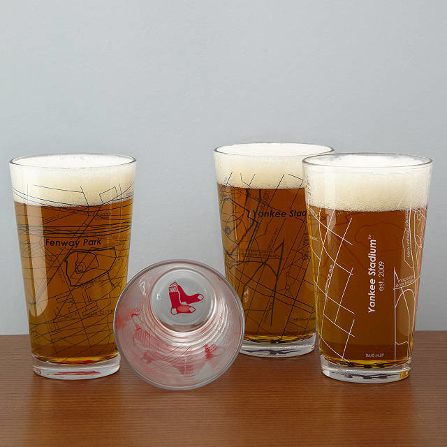 four ballpark printed pint glasses showcasing different teams and stadiums