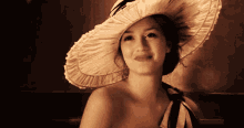 Blair wearing a hat and smiling
