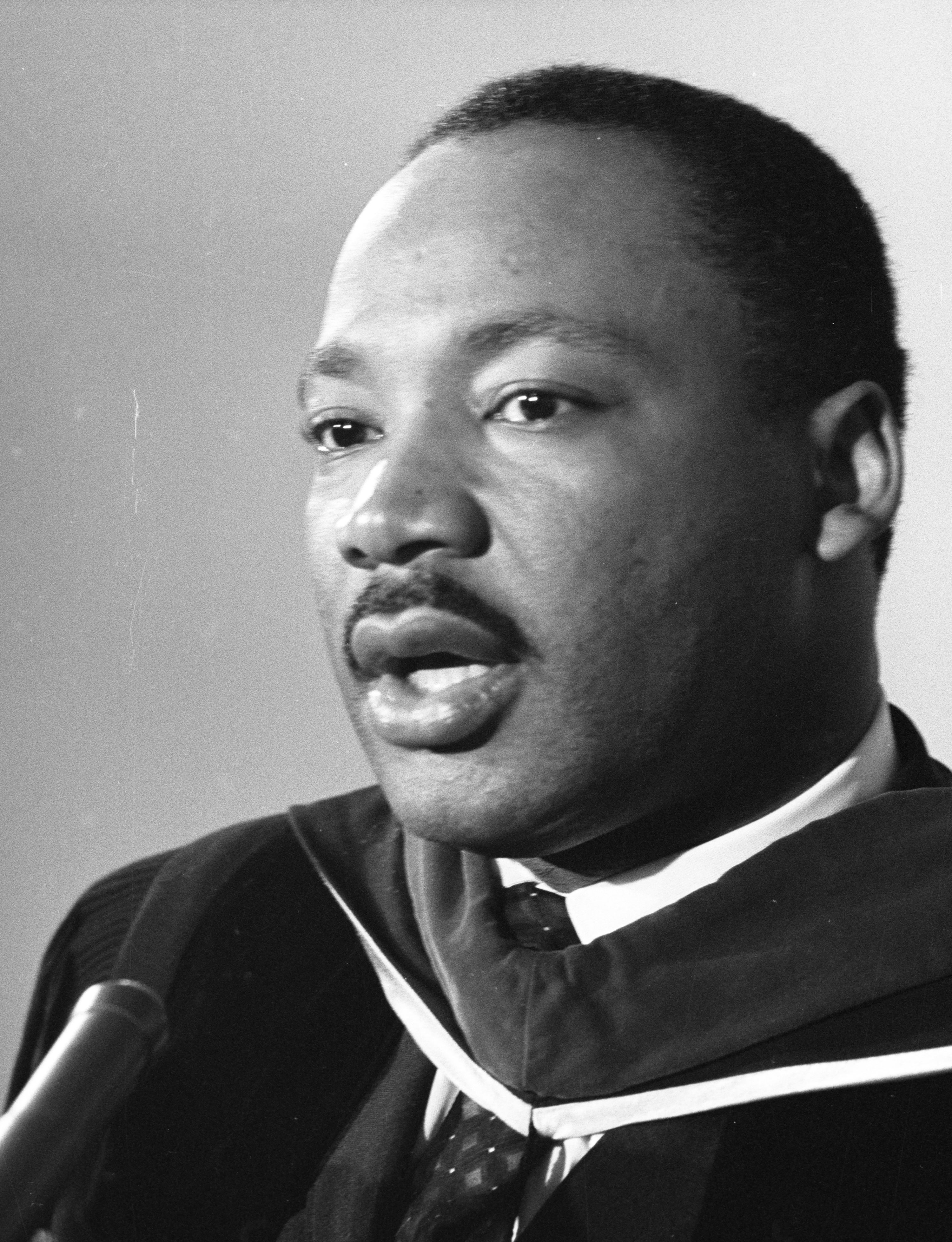 Martin Luther King Jr. talks during a 1965 press conference