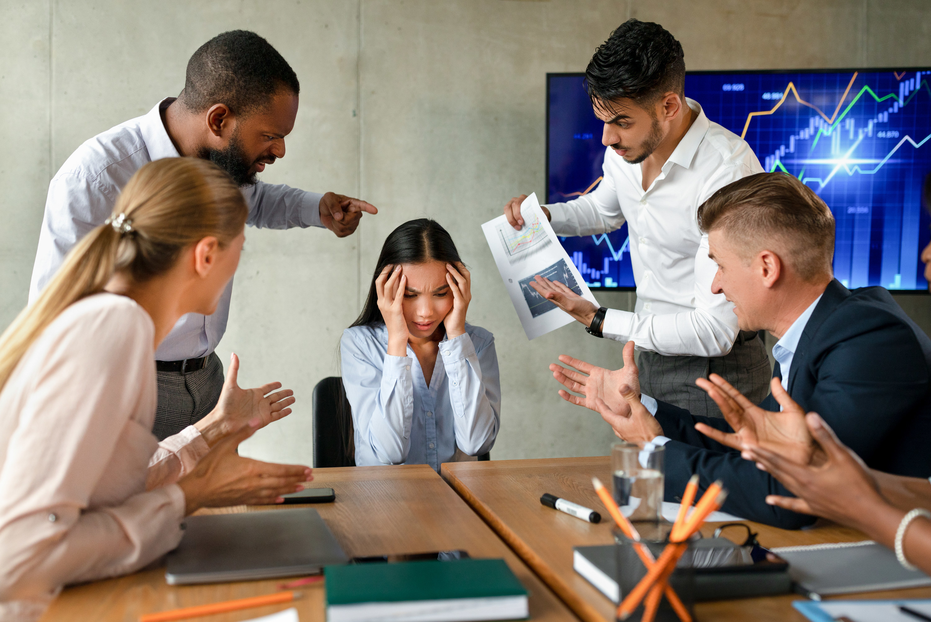 Woman being bullied by her coworkers