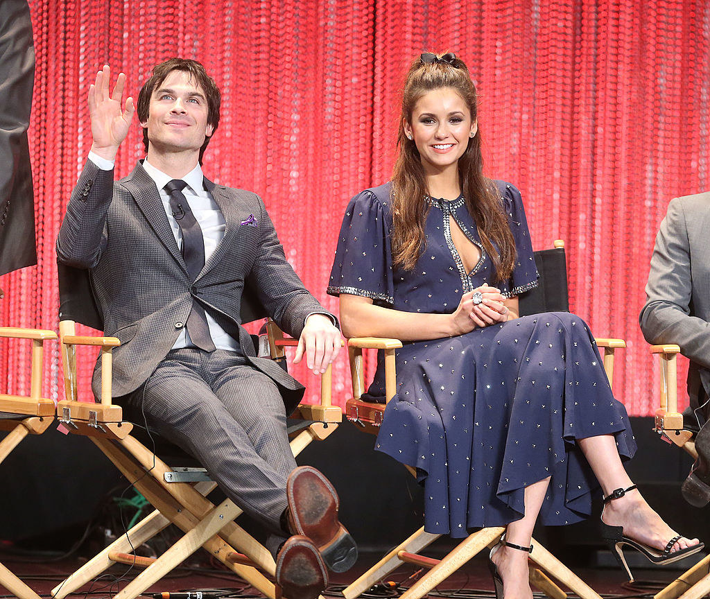 the costars sit together onstage for a vampire diaries panel