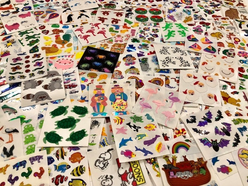 A large stack of stickers in a pile