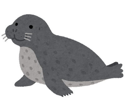 ニャンと 雪の上に寝転がっているのはアザラシではなくて