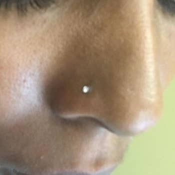 Reviewer wearing the white gold nose stud