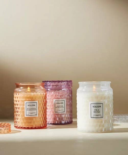 An image of three embossed candles
