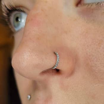 Reviewer wearing the nose ring