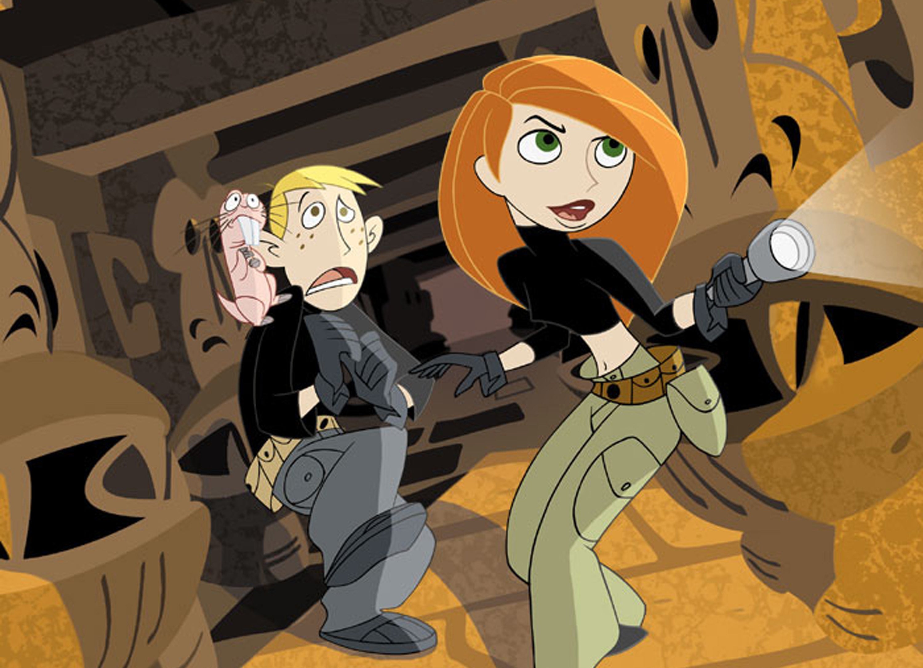 Kim Possible and Ron Stoppable walk down a hallway