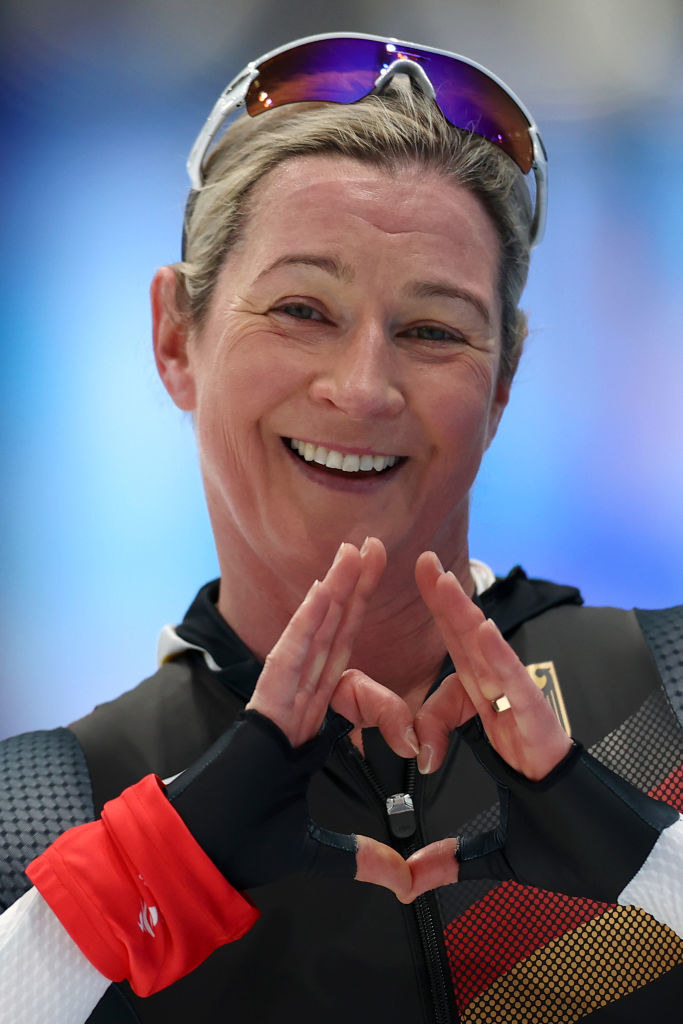 Pechstein making a heart with her hands after skating