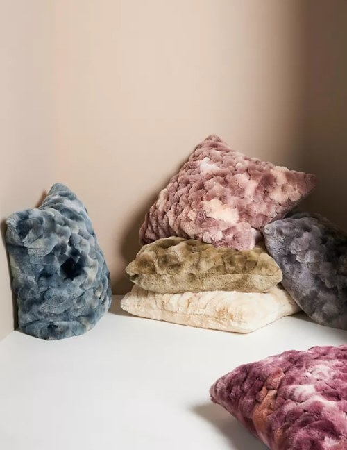 An image of a six luxe dyed faux fur pillows