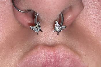 Reviewer wearing the butterfly nose ring