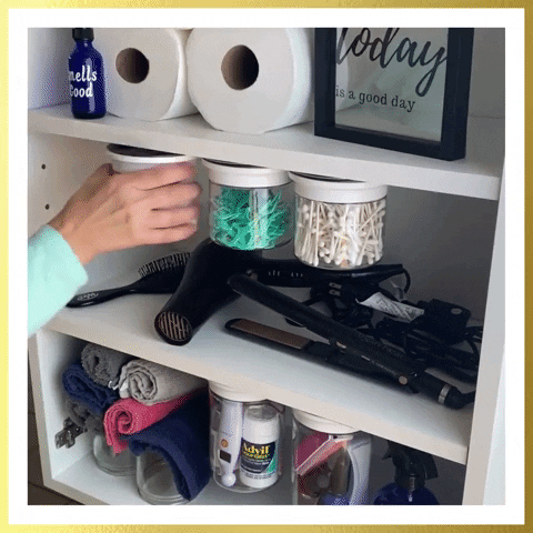 a gif of someone moving the canisters and grabbing a cotton ball