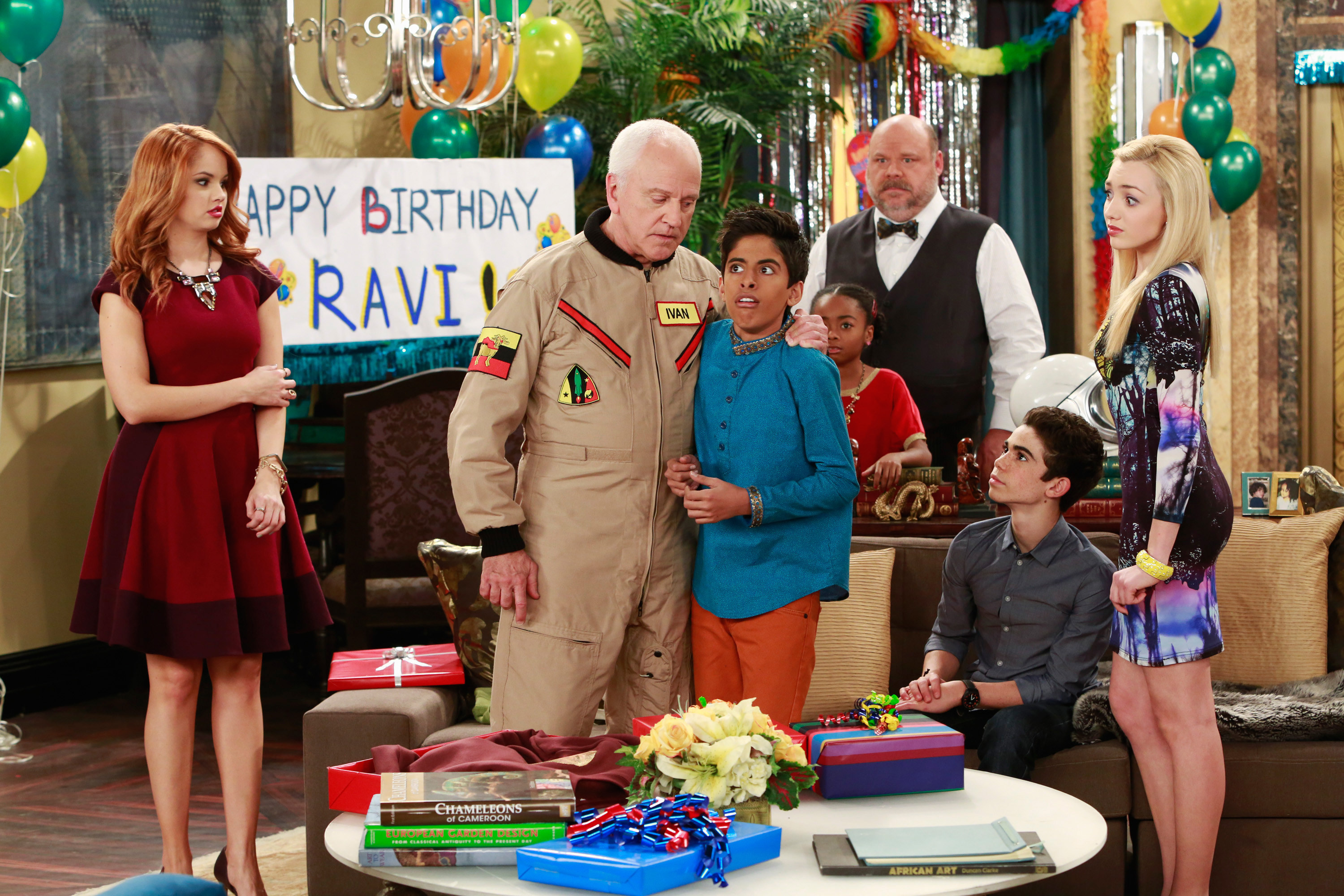 The cast of Jessie in an episode about Ravi&#x27;s birthday party