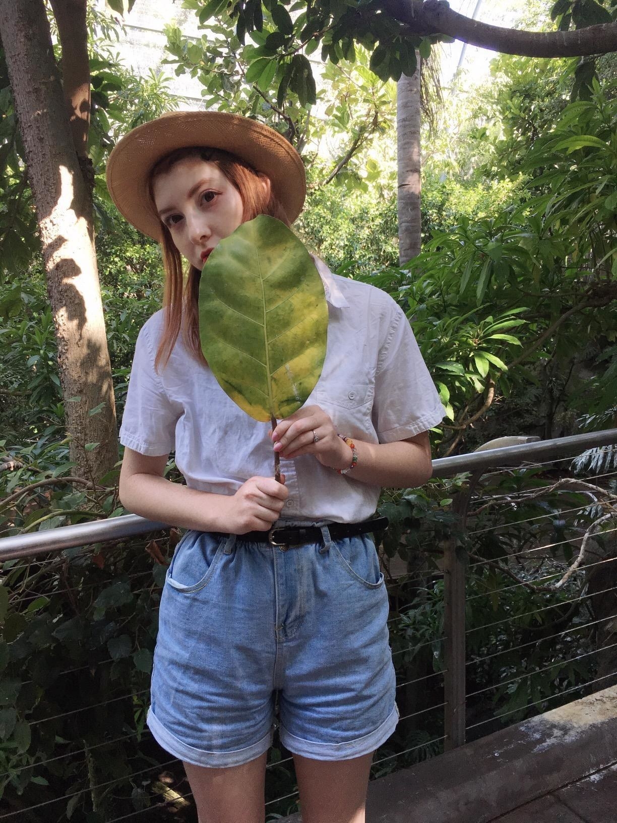 reviewer wearing the denim shorts