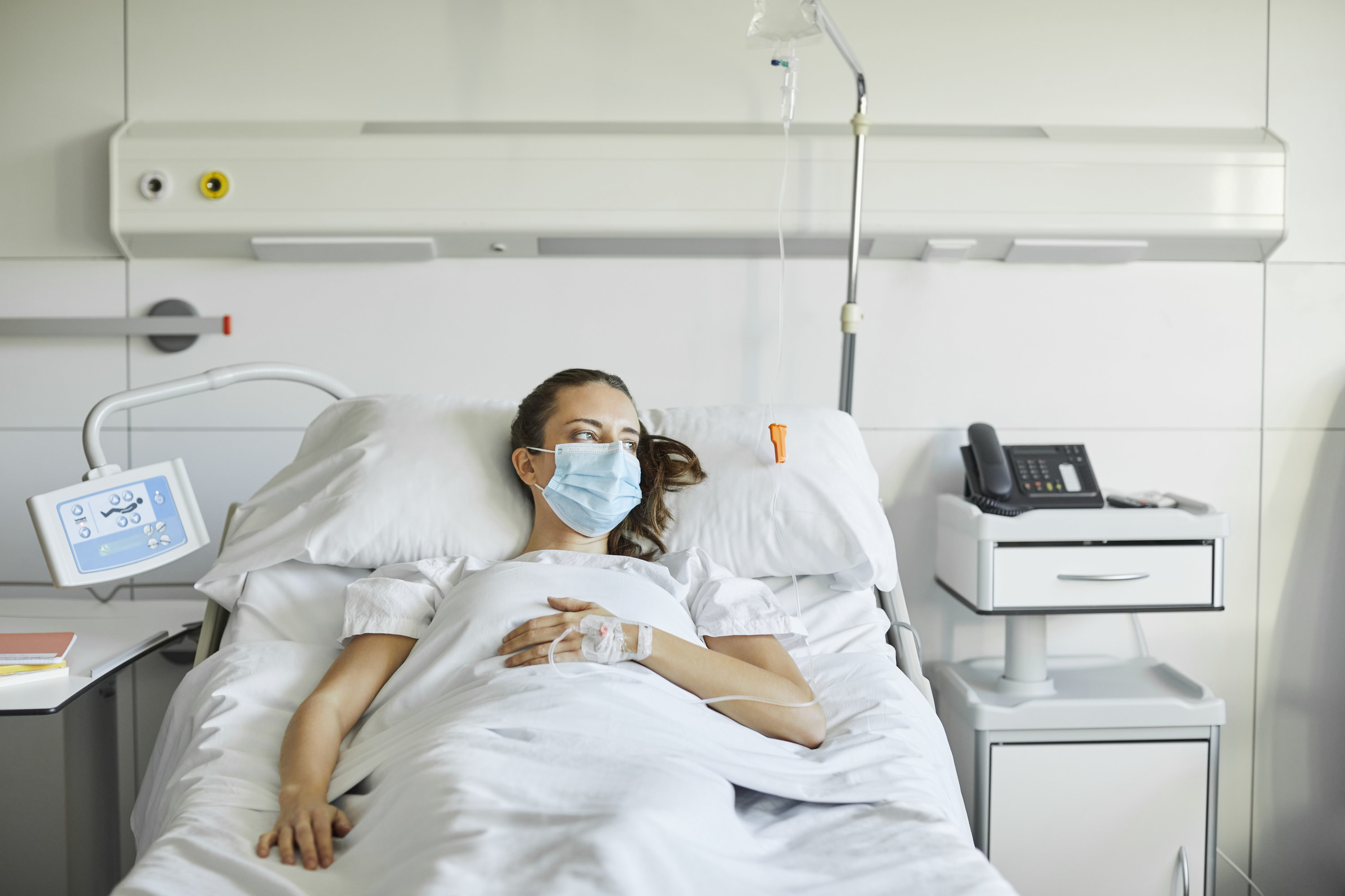 Woman resting in a hospital bed