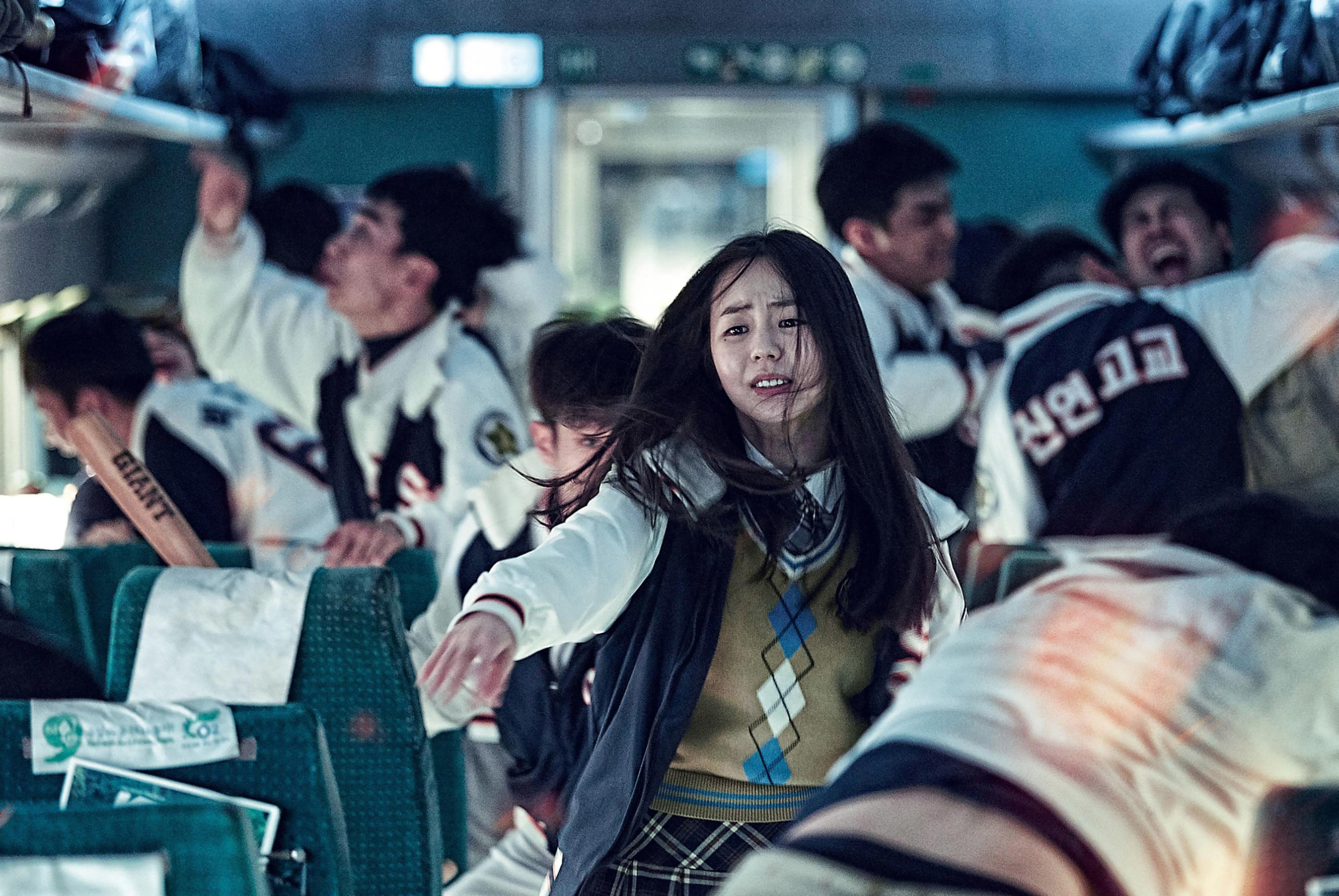 Sohee runs through a crowded train