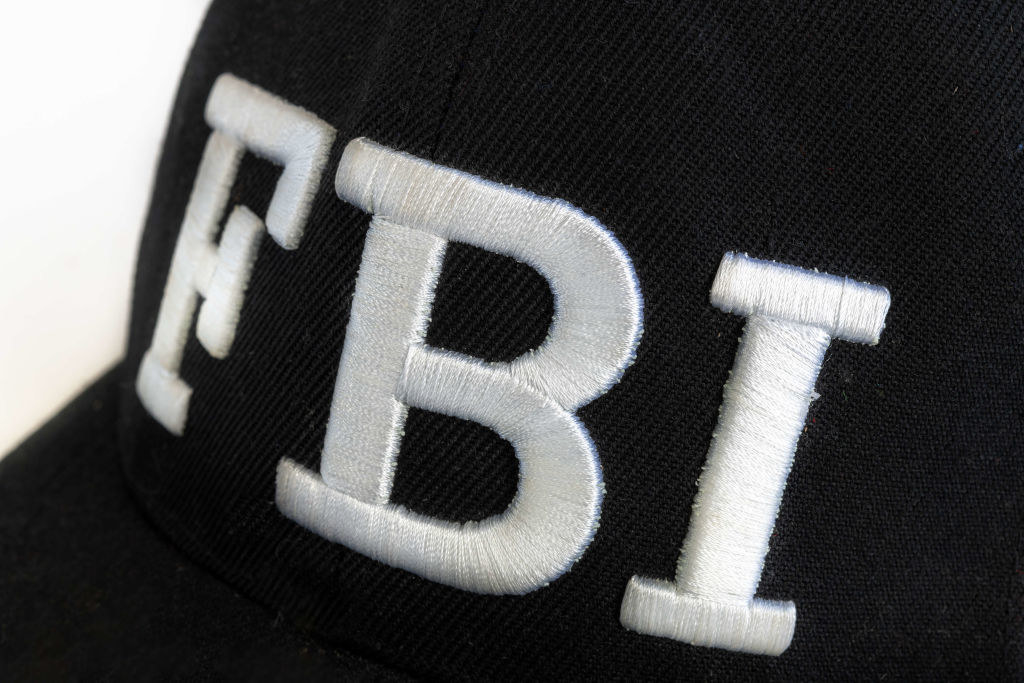 an FBI hat