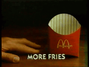 GIF of a hand tapping next to an empty fry container