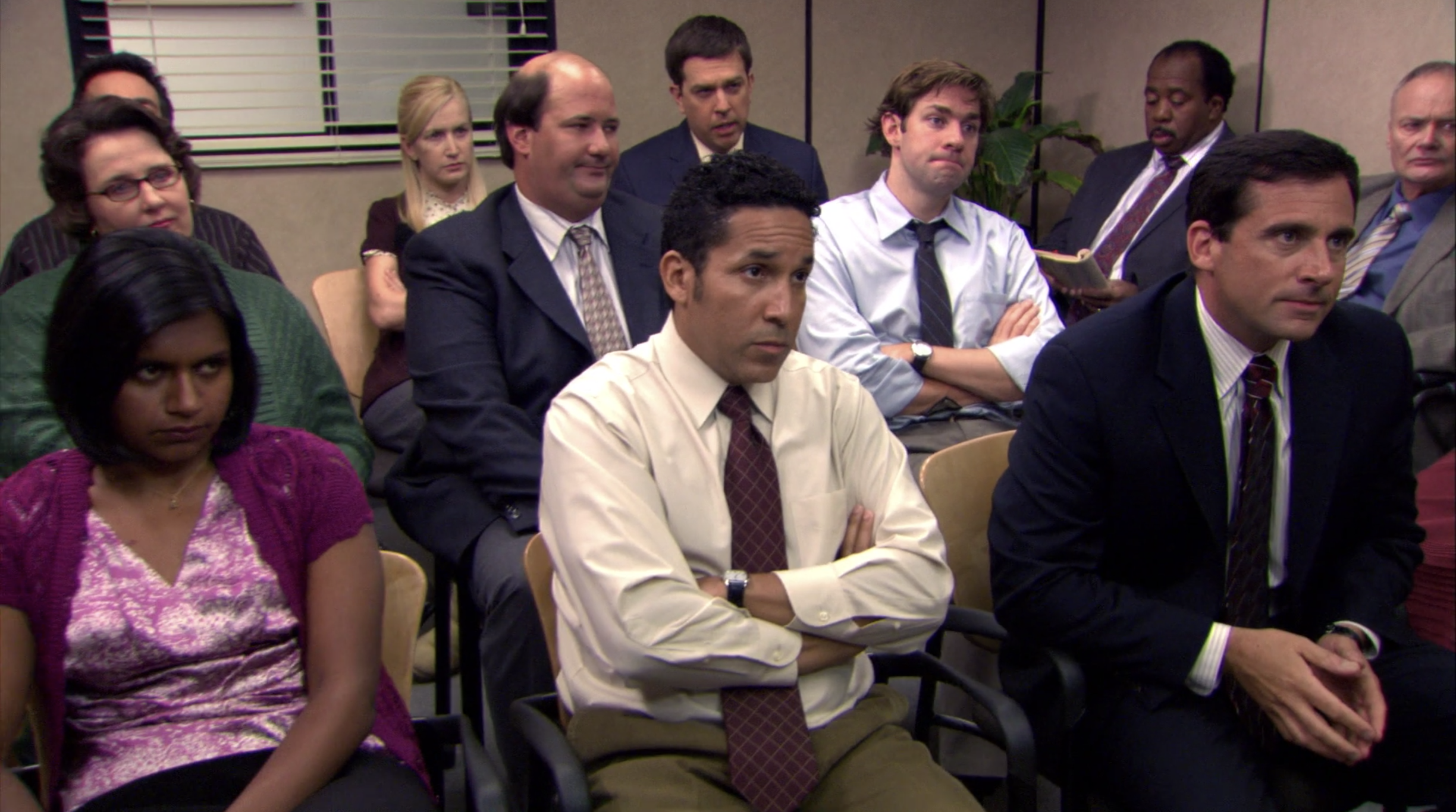 The cast of the Office sit in a room together