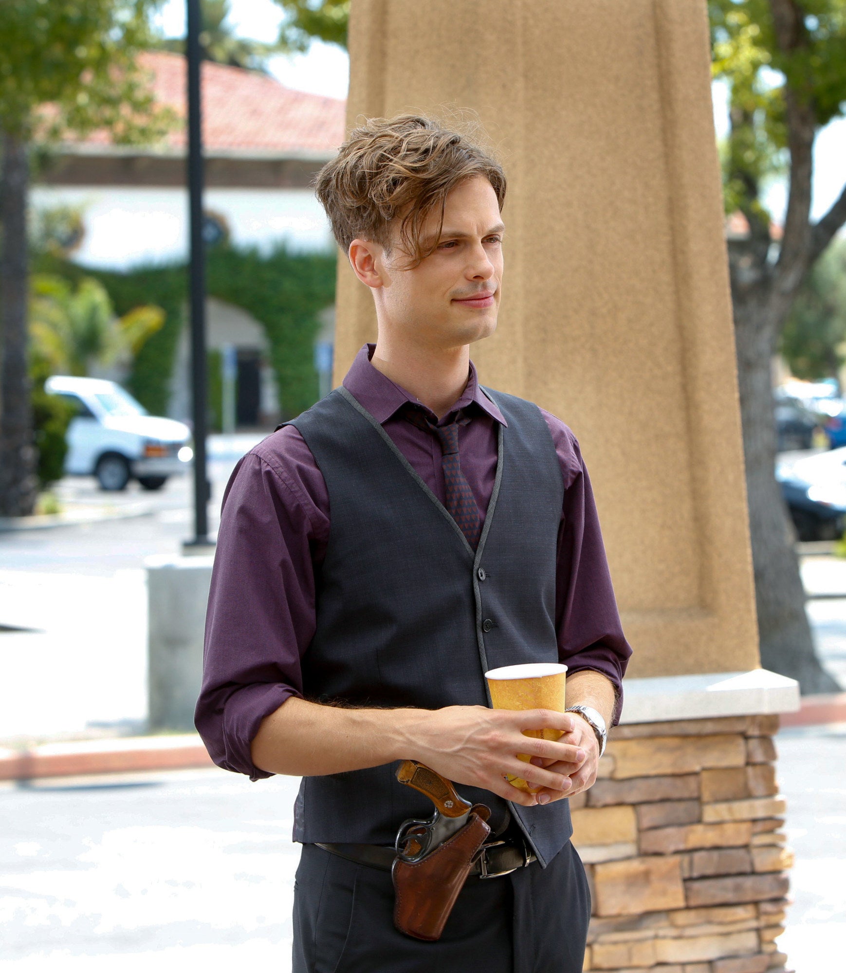 Spencer Reid holding coffee