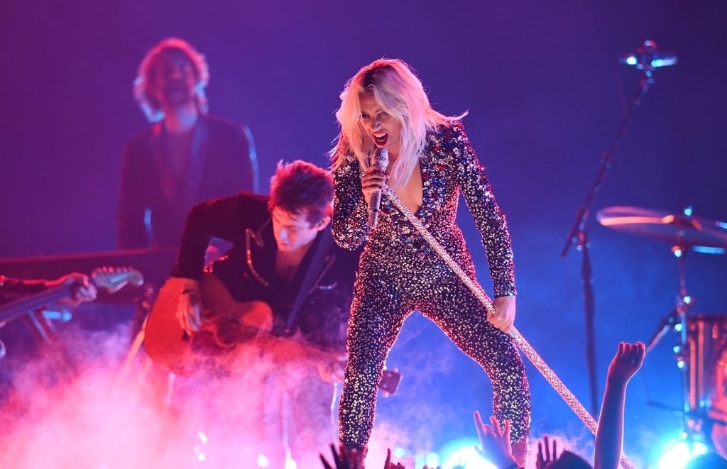 Lady Gaga performing in a bedazzled jumpsuit