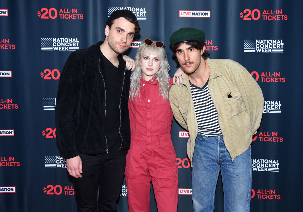 Paramore Members Hayley Williams, Zac Farro, and Taylor York pose together at a National Concert Week event
