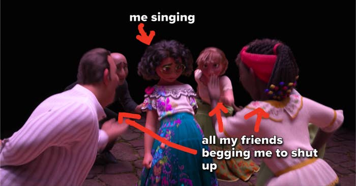 Maribel surrounded by her family singing to her