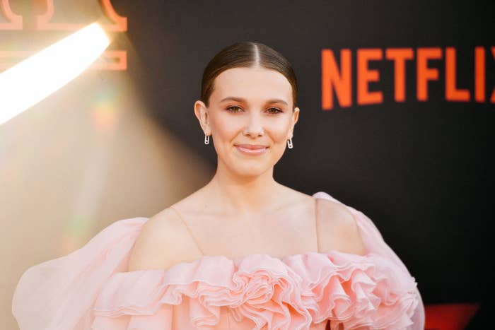 Millie at a Netlix red carpet event in a pink tulle dress