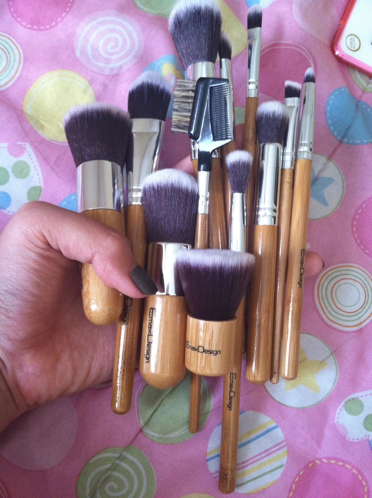 a reviewer holding the brush set