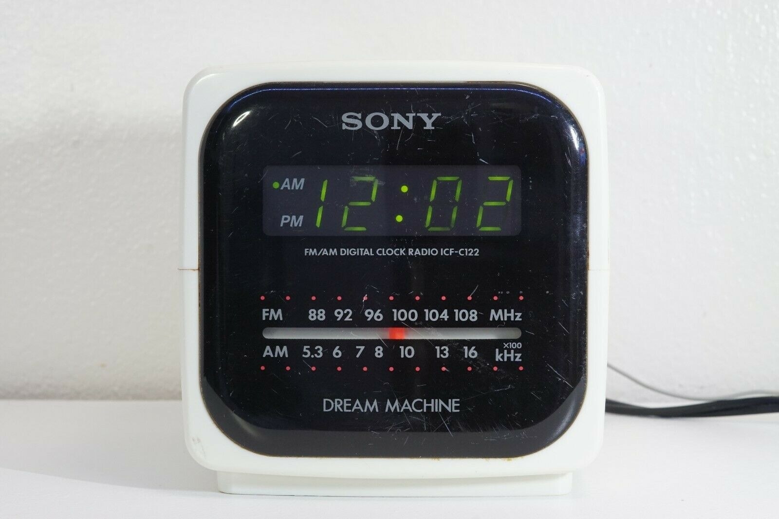A white Sony Dream Machine radio alarm clock