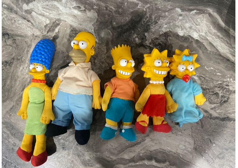 Marge, Homer, Bart, Lisa, and Maggie stuffed dolls