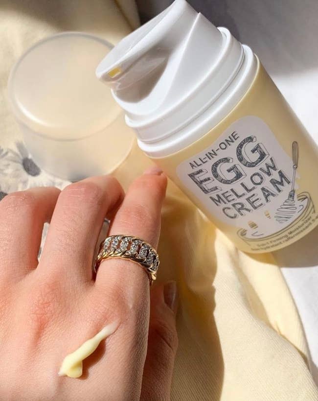the Egg Mellow cream applied on a model's hand
