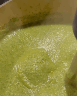 Blending up a pot of vegetable soup with an immersion blender