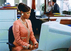 Tyra Banks typing at a computer