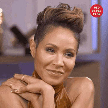 a gif of Jada Pinkett Smith staring happily at someone off-screen