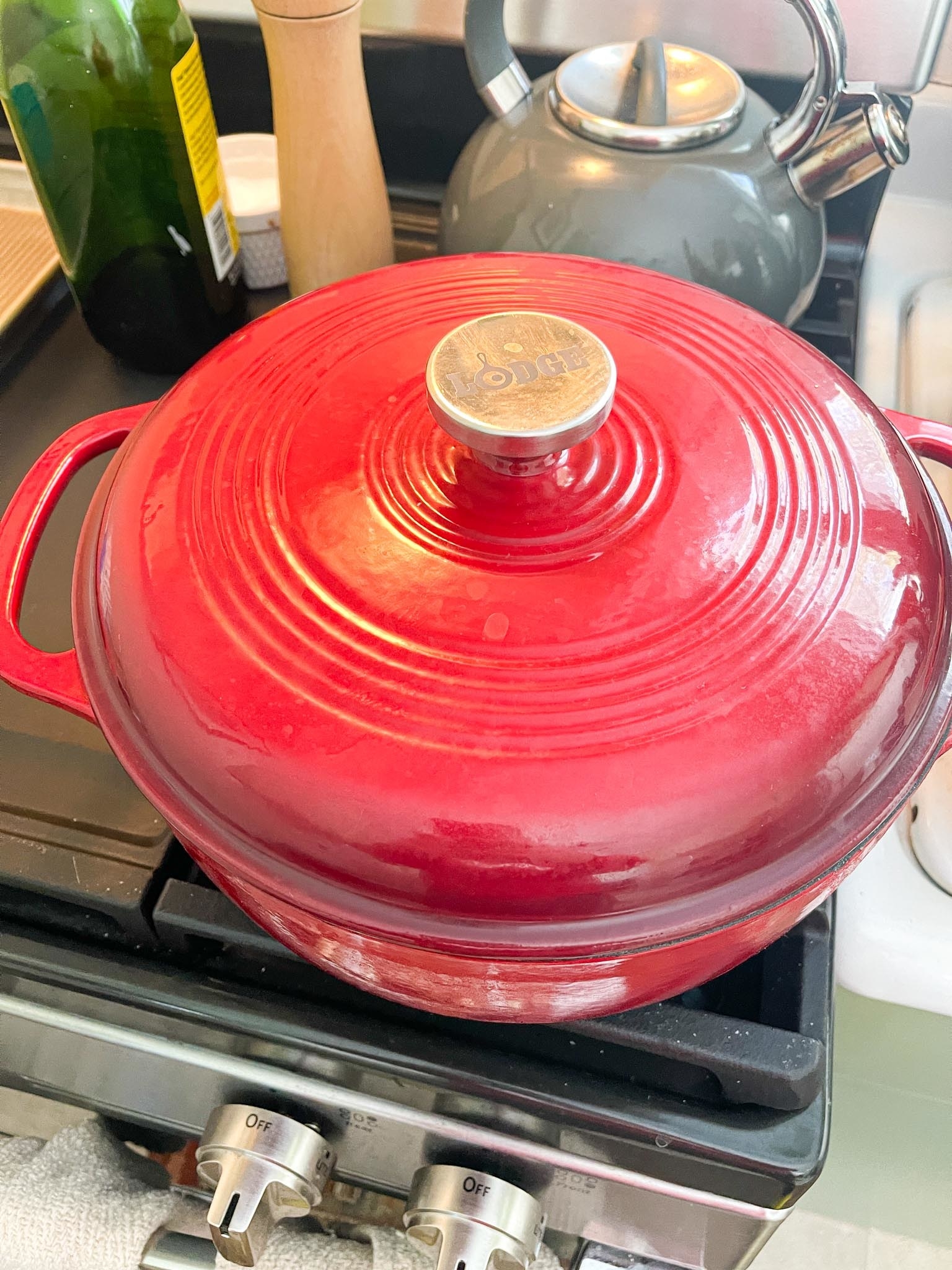 Red Dutch oven on a stovetop